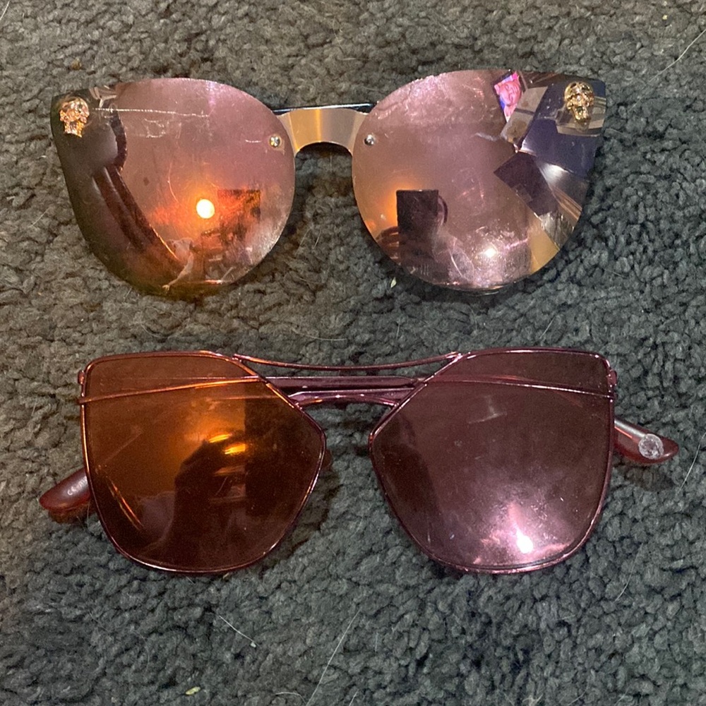 Two pair of pink sunglasses